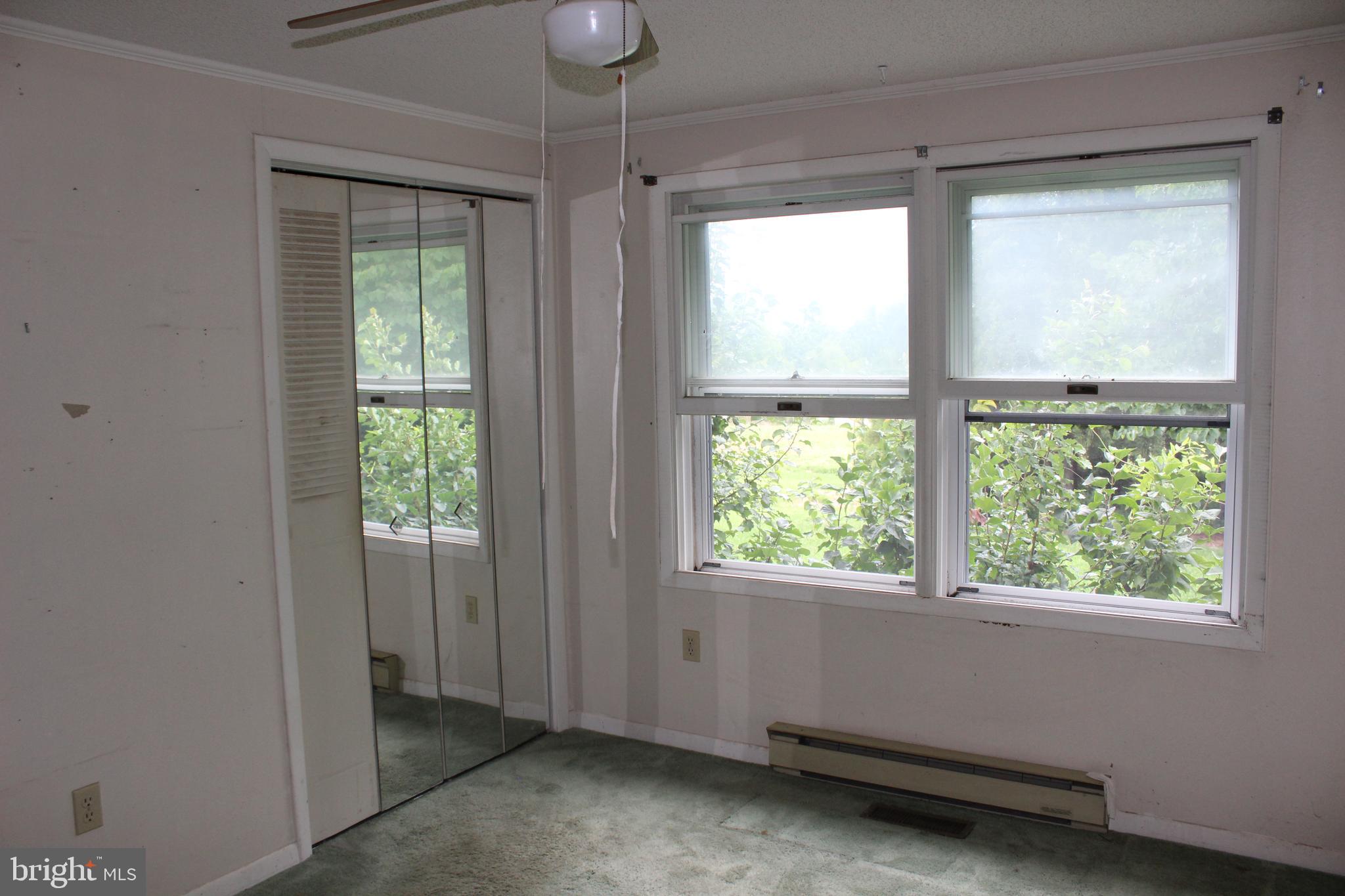 801 Boyle Road Fairfield, PA 17320 - Photo 28 of 38 a room with a window and a ceiling fan