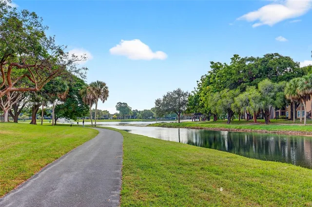 a view of a lake with a big yard