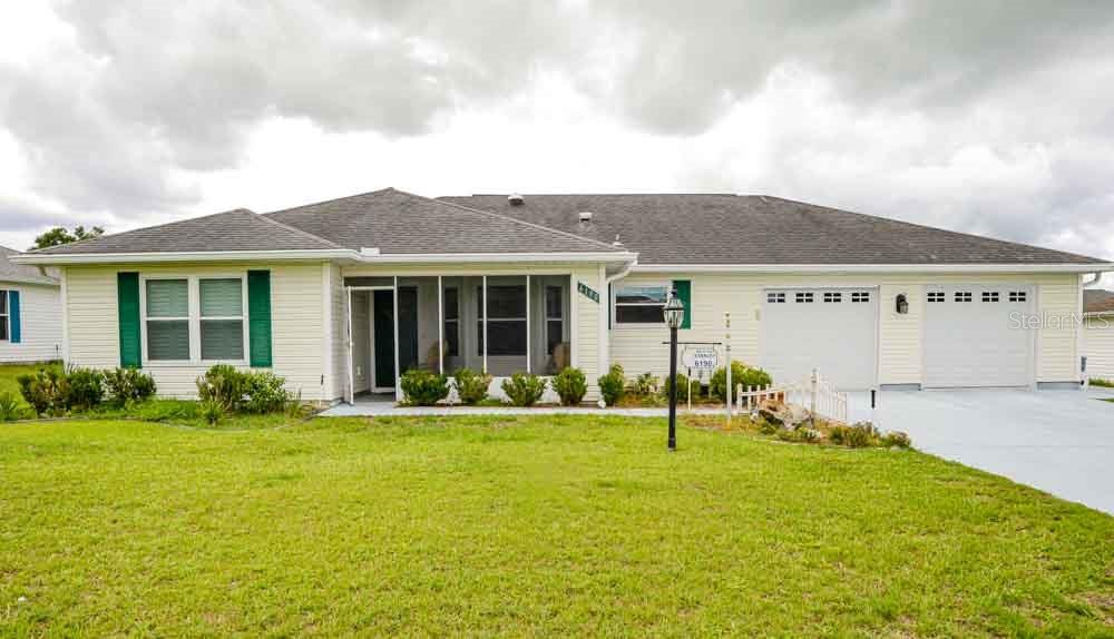 Undisclosed Address Ocala, FL 34476 - Photo 1 of 1 a view of a house with a backyard