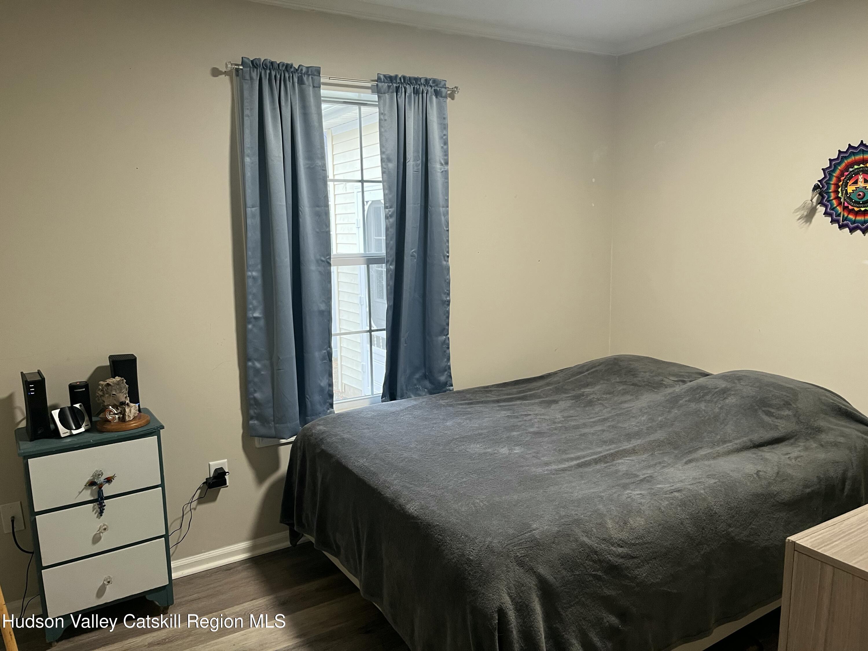 13 Mahoney Road Stuyvesant, NY 12173 - Photo 11 of 19 a bedroom with a bed and a window