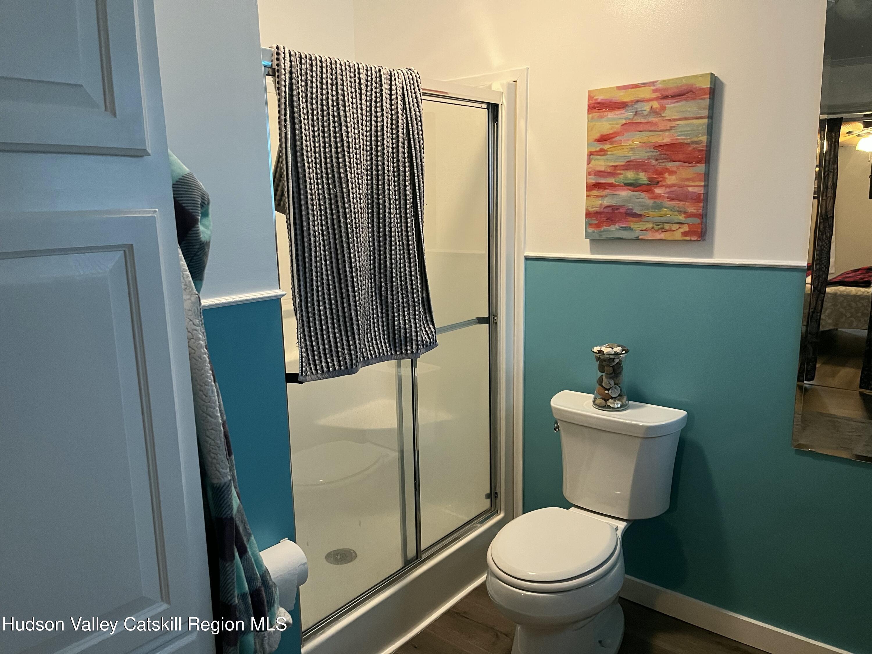 13 Mahoney Road Stuyvesant, NY 12173 - Photo 16 of 19 a bathroom with a toilet a sink and a shower