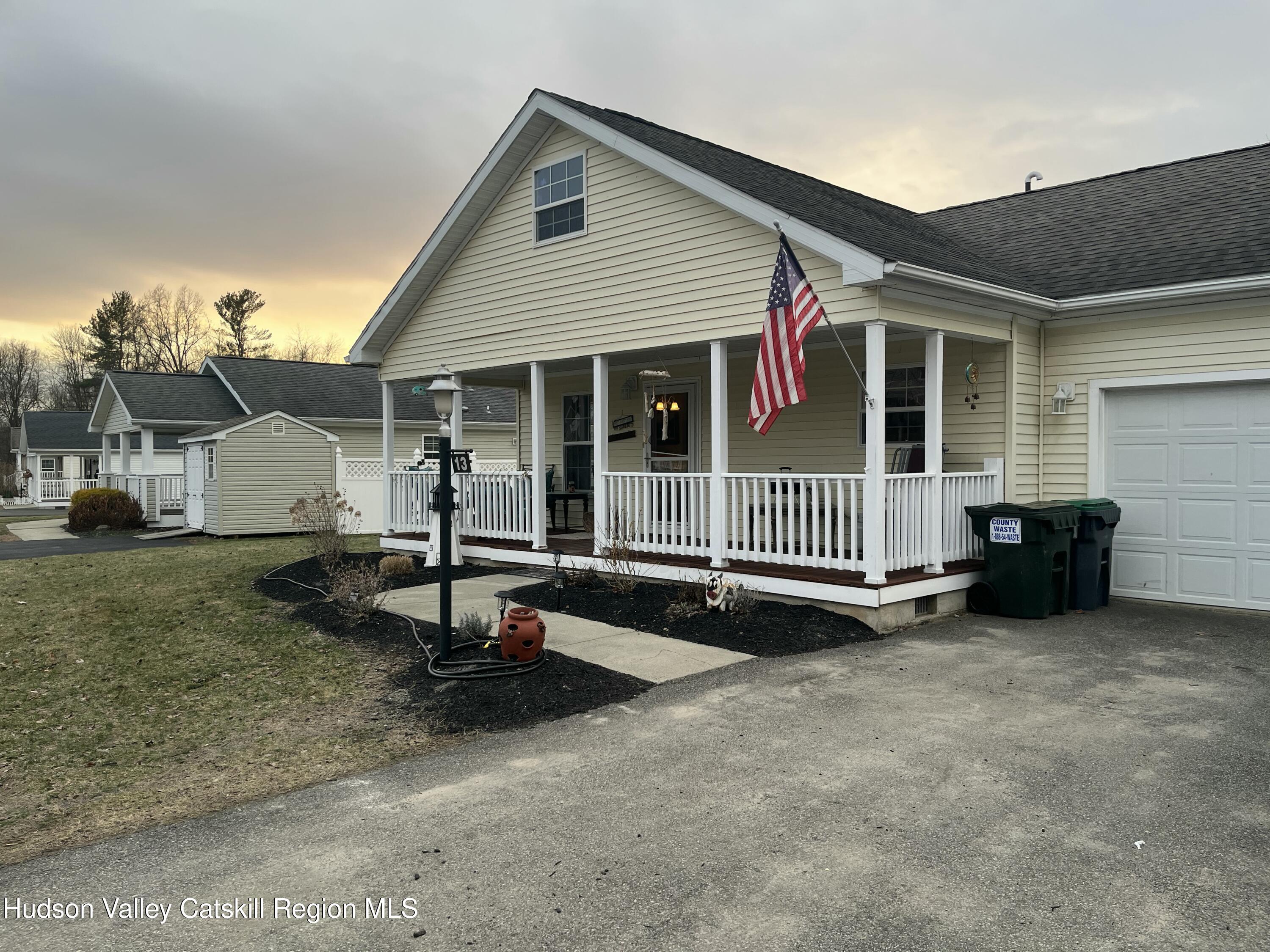 13 Mahoney Road Stuyvesant, NY 12173 - Photo 18 of 19 a house view with a sitting space and garden