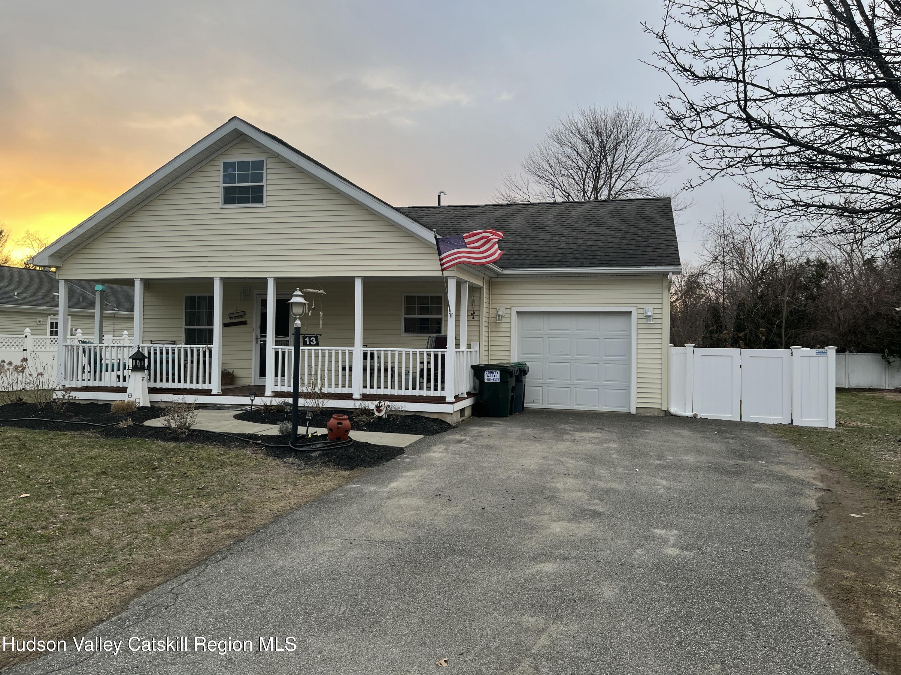 13 Mahoney Road Stuyvesant, NY 12173 - Photo 19 of 19 a view of a house with a patio and a yard