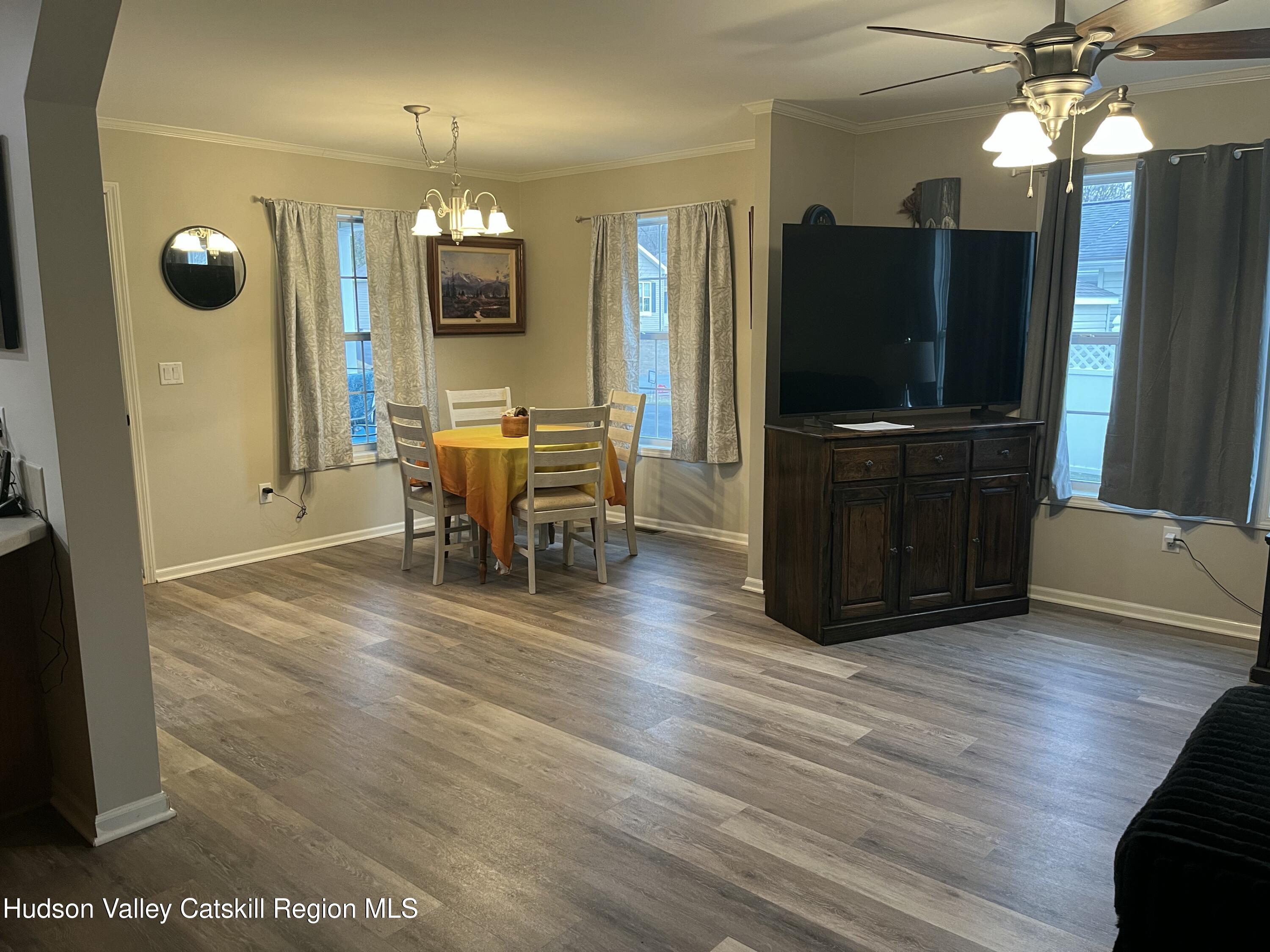 13 Mahoney Road Stuyvesant, NY 12173 - Photo 8 of 19 a view of a livingroom with furniture window and wooden floor