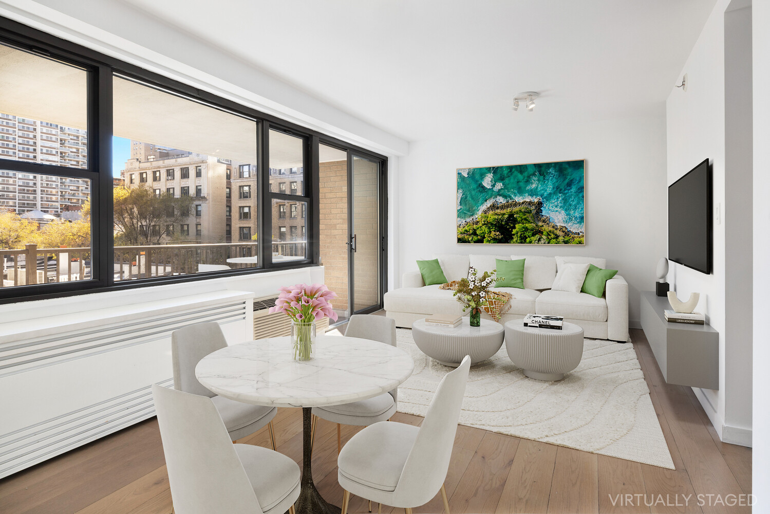 175 West 95th Street, Unit 7A Manhattan, NY 10025 - Photo 2 of 11 a living room with furniture and a flat screen tv