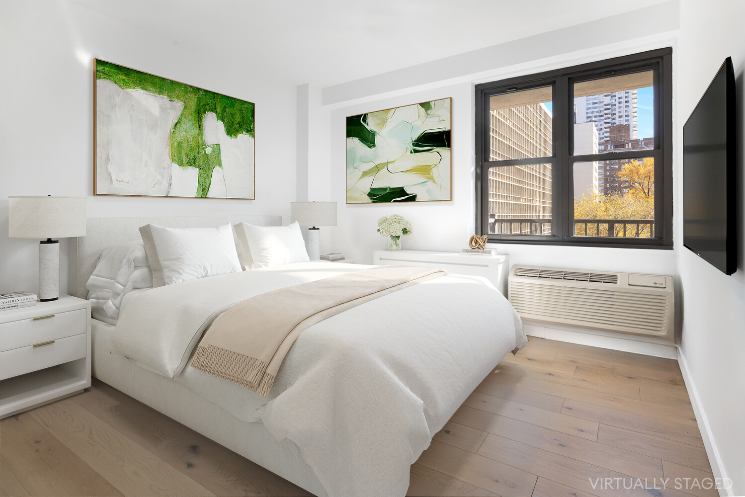 175 West 95th Street, Unit 7A Manhattan, NY 10025 - Photo 4 of 11 a bedroom with a bed and a large window