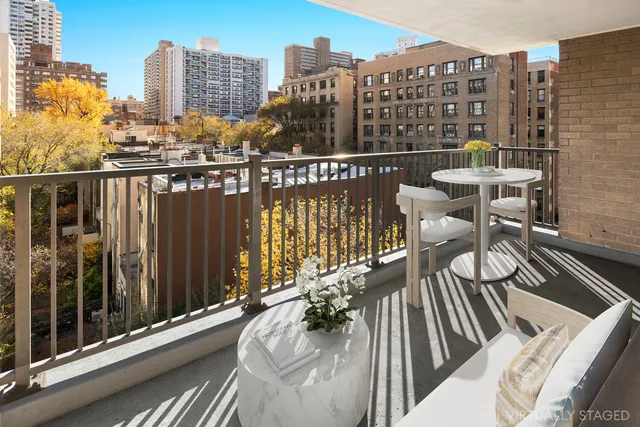 a view of balcony with furniture