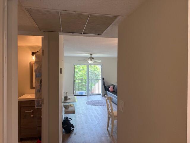 21906 Lake Forest Circle Boca Raton, FL 33433 - Photo 2 of 20 a room that has a bed and a chair in it