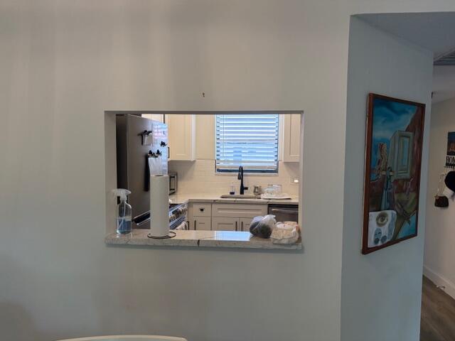 21906 Lake Forest Circle Boca Raton, FL 33433 - Photo 5 of 20 a kitchen with sink and window