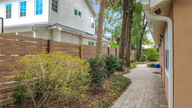 a backyard of a house with garden