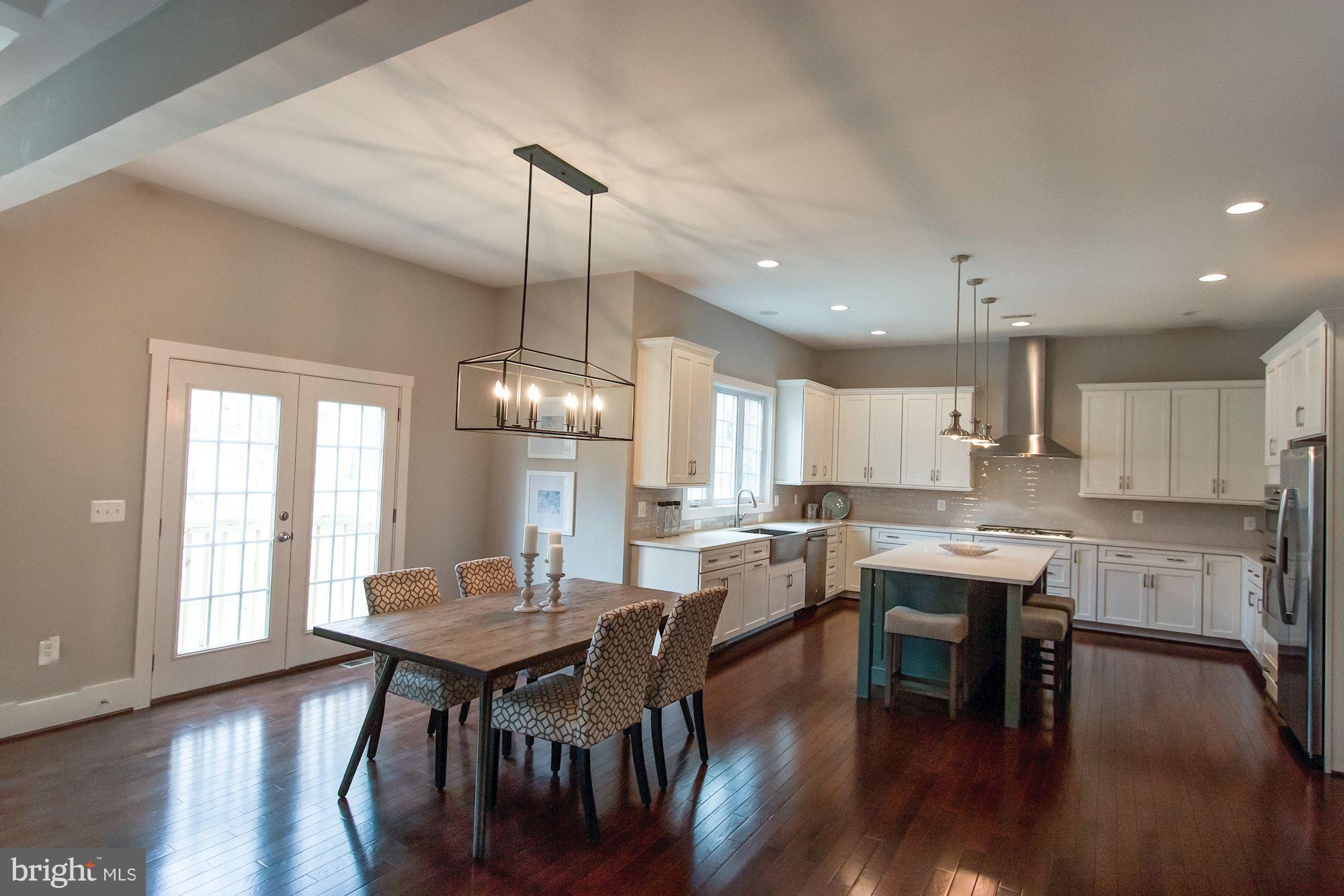 9420 Athens Road Fairfax, VA 22032 - Photo 4 of 19 a view of a dining room with furniture window and wooden floor