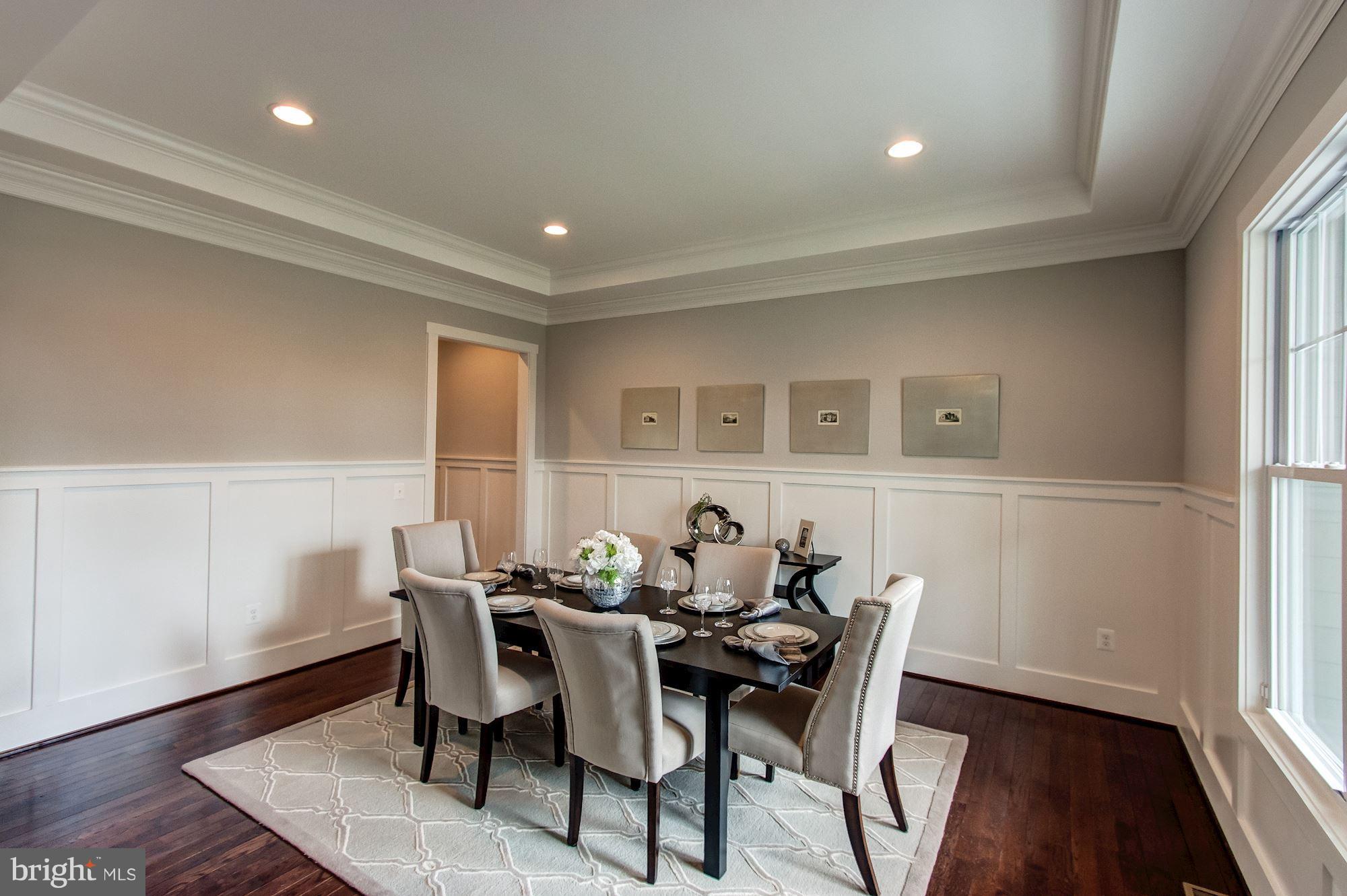 9420 Athens Road Fairfax, VA 22032 - Photo 8 of 19 a view of a dining room with furniture and wooden floor