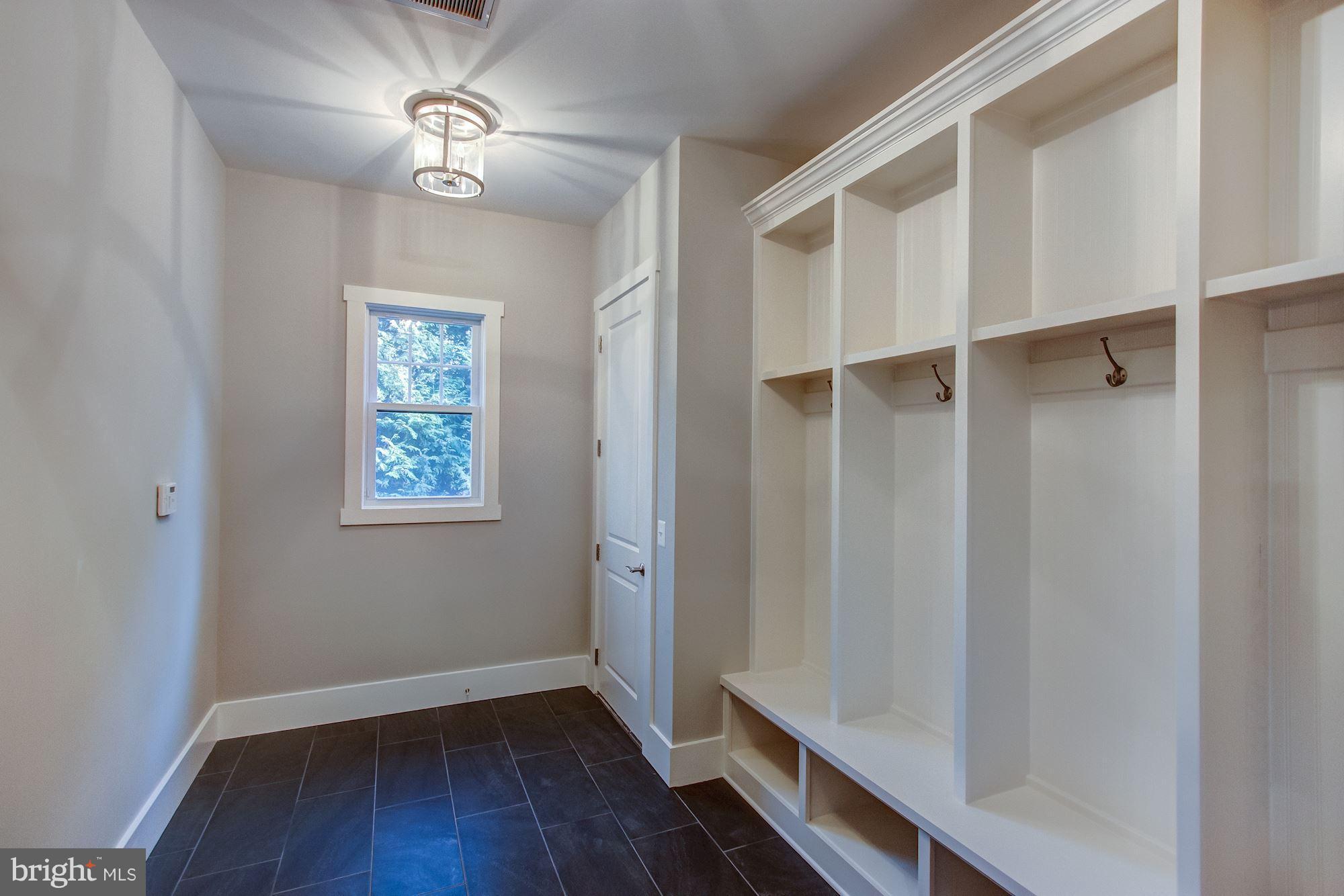 9420 Athens Road Fairfax, VA 22032 - Photo 10 of 19 a view of empty room with wooden floor