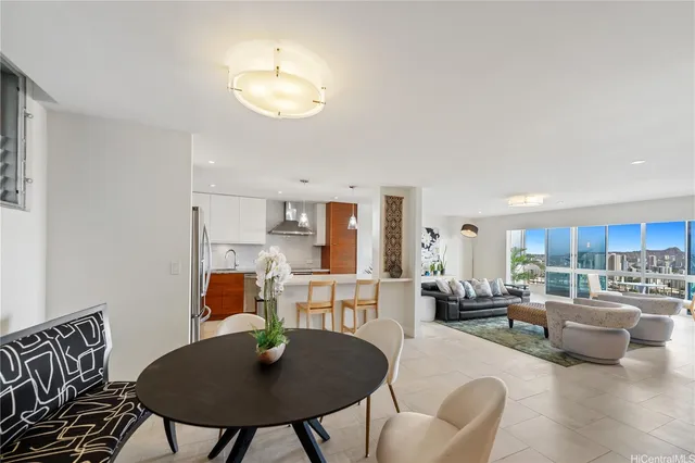 a living room with furniture and a table