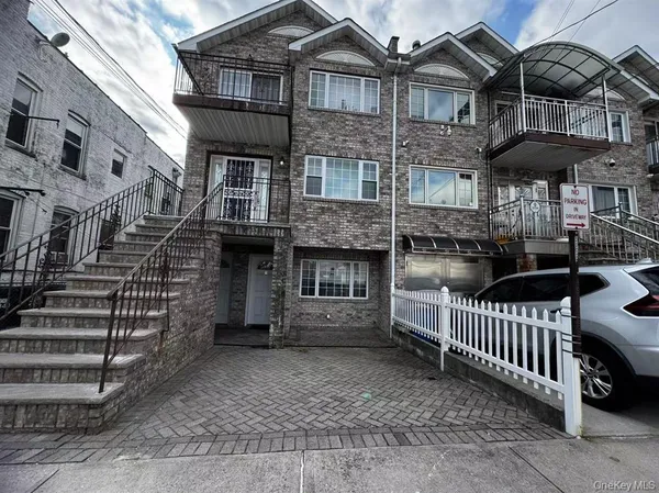 front view of a house with a small yard