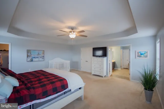 a bedroom with a bed and furniture