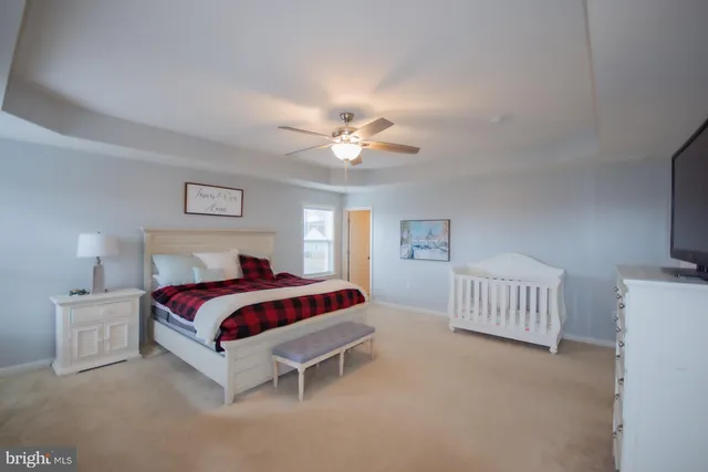 a bathroom with a sink toilet and mirror