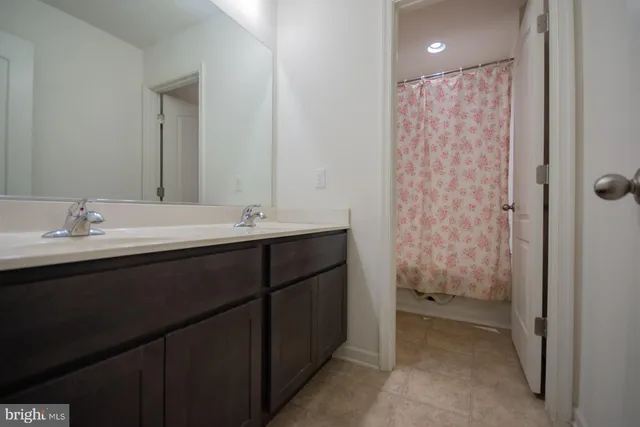 a backyard of a house with outdoor seating