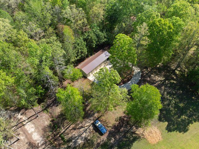 7875 Burnett Road Dunn, NC 28334 - Photo 27 of 34 VIEW OF HOUSE, GARAGE AND LAND FROM THE