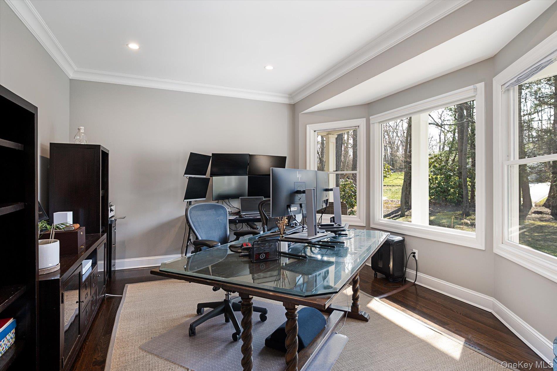 7 Riga Lane Melville, NY 11747 - Photo 14 of 33 a view of a workspace with furniture and a window