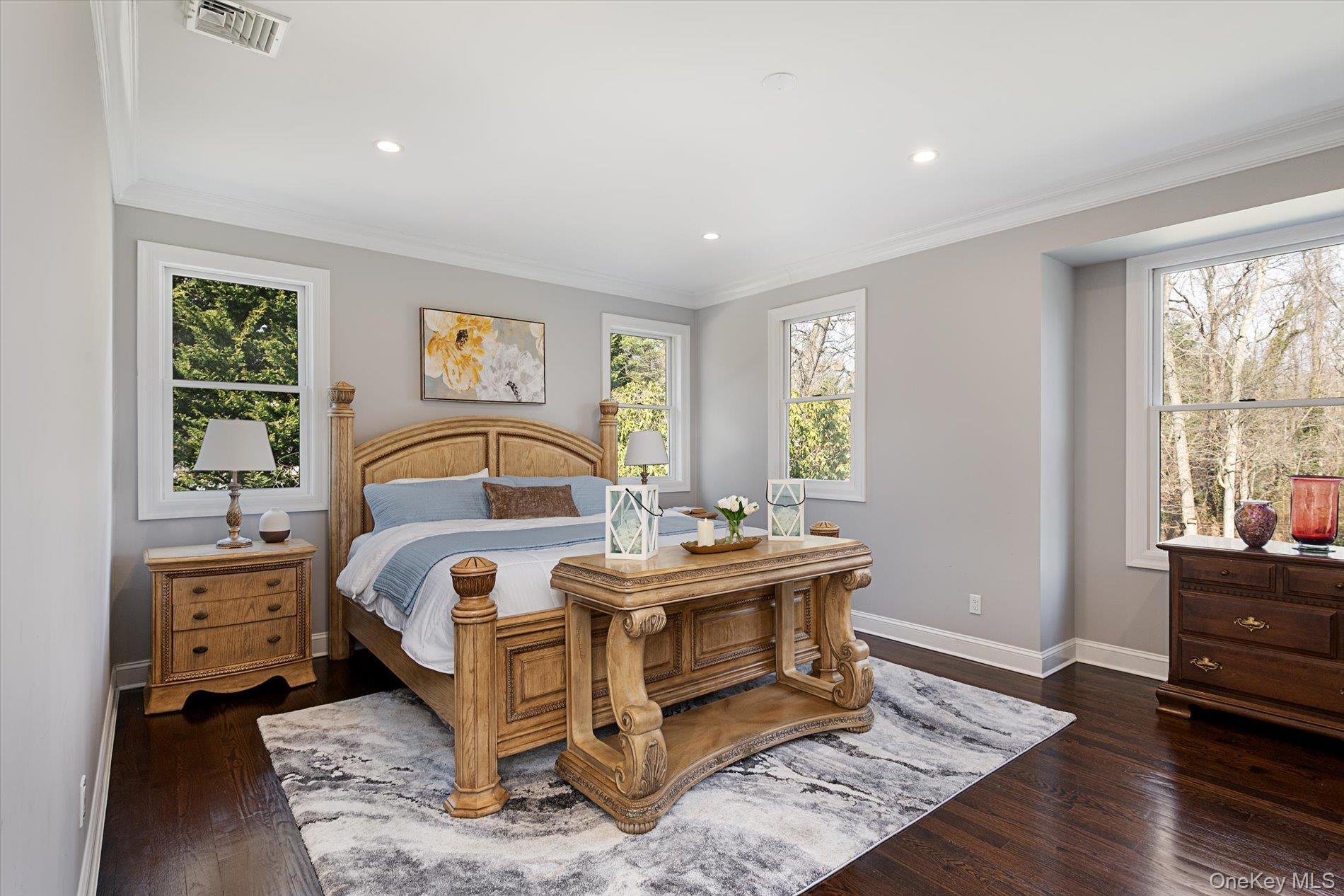 7 Riga Lane Melville, NY 11747 - Photo 17 of 33 a bedroom with a bed and a window