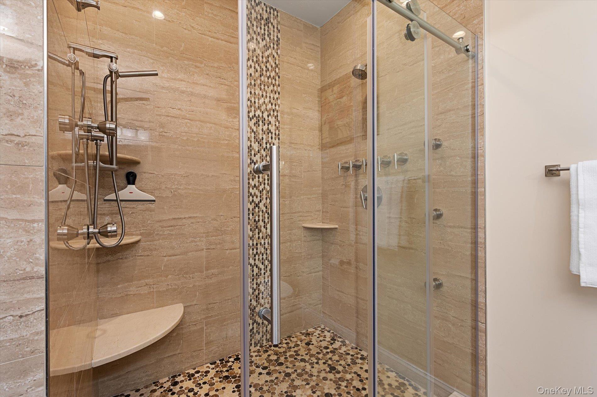 7 Riga Lane Melville, NY 11747 - Photo 21 of 33 a bathroom with a shower and toilet