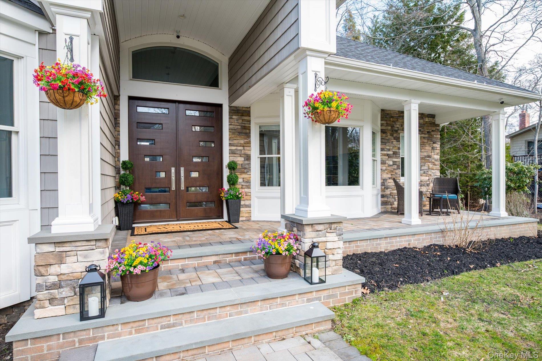7 Riga Lane Melville, NY 11747 - Photo 3 of 33 a view of a street with sitting area