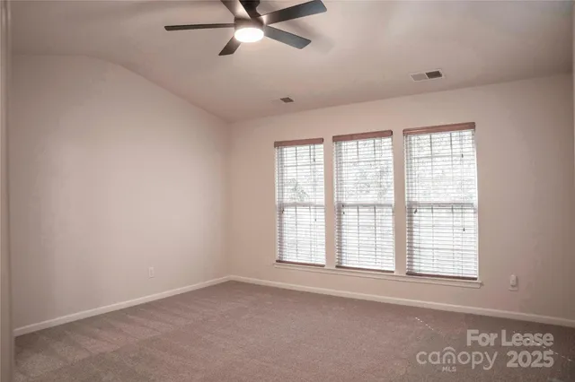 a bathroom with a double vanity sink and mirror