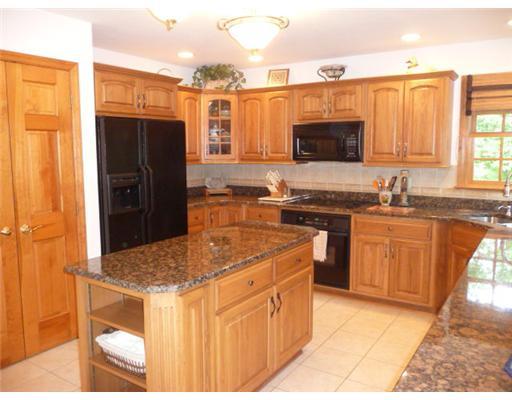 280 Ridge Avenue Economy, PA 15042 - Photo 3 of 18 Kitchen. The kitchen has all the bells and whistles. Beautiful Hickory cabinetry with plate rack and granite counters. Enjoy the view from the corner window with deep double bowl stainless steel sink.