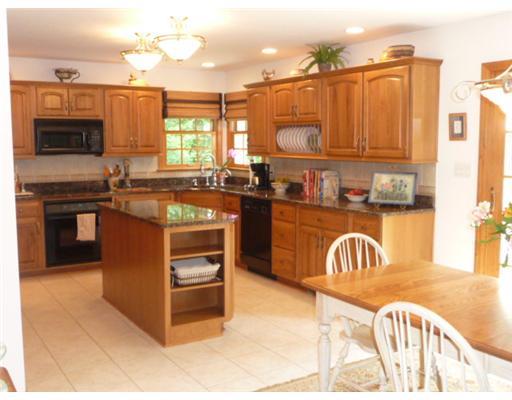 280 Ridge Avenue Economy, PA 15042 - Photo 4 of 18 Kitchen. The center island has shelving for cook books. Theres a smooth top electric cook top, built-in microwave, built-in wall oven, ceramic tile backsplash and ceramic tile flooring. The refrigerator is included!