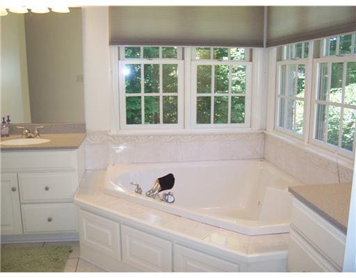 280 Ridge Avenue Economy, PA 15042 - Photo 10 of 18 Master Bath/Spa. Soak away the cares of the day in large corner jacuzzi tub with ceramic tile floor and back splash. His and her vanities with corian tops, seperate commode area with walk-in shower.