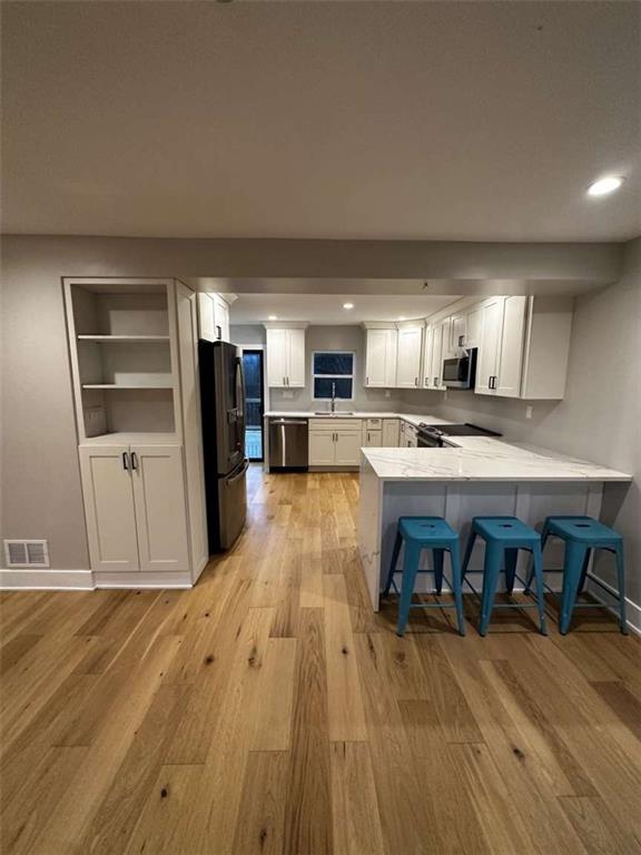 5131 Keiners Lane Pittsburgh, PA 15205 - Photo 21 of 24 a view of kitchen with cabinets and wooden floor
