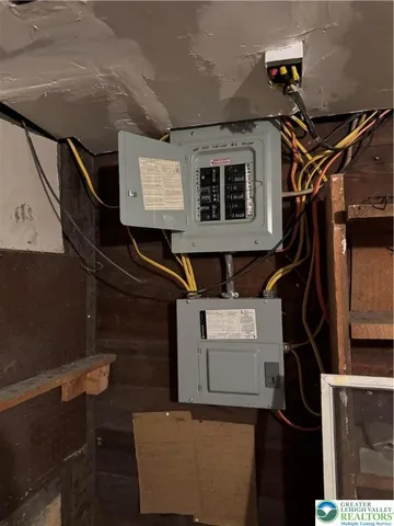 a bathroom with a shower and a sink