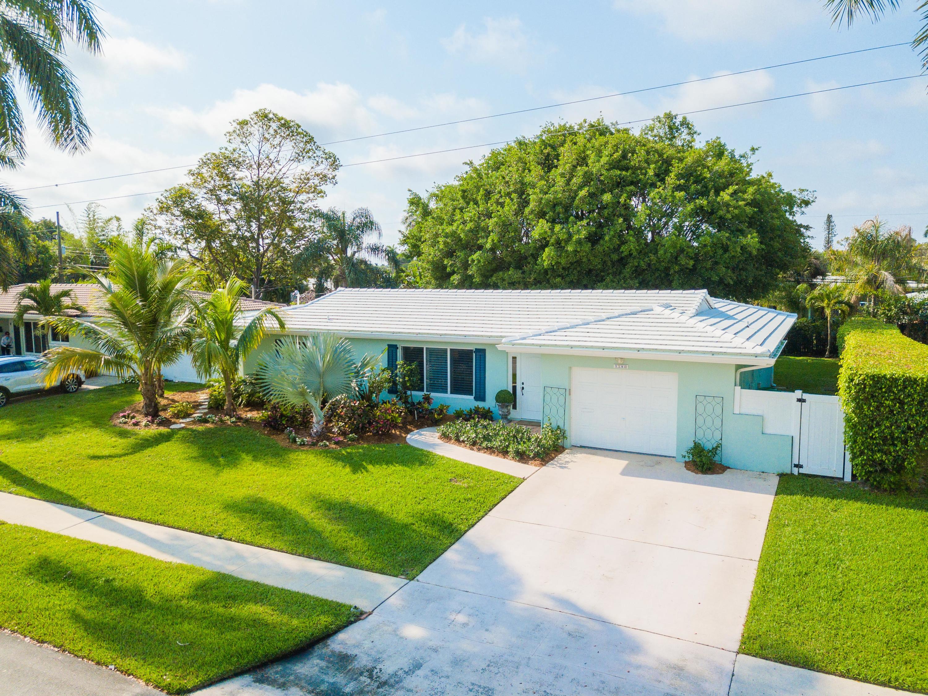 1140 Southwest 13th Drive Boca Raton, FL 33486 - Photo 2 of 24 Front