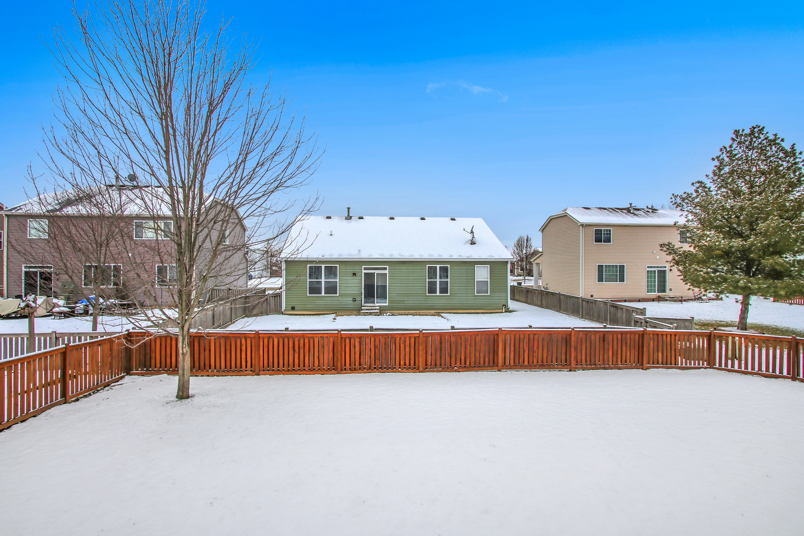1014 Devon Drive Antioch, IL 60002 - Photo 11 of 51 a view of a house with a yard