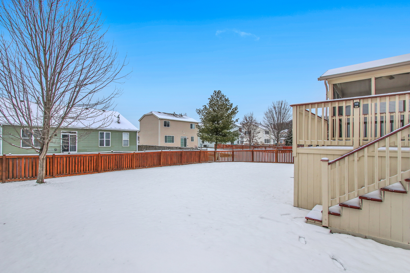 1014 Devon Drive Antioch, IL 60002 - Photo 12 of 51 a view of an house with swimming pool and deck