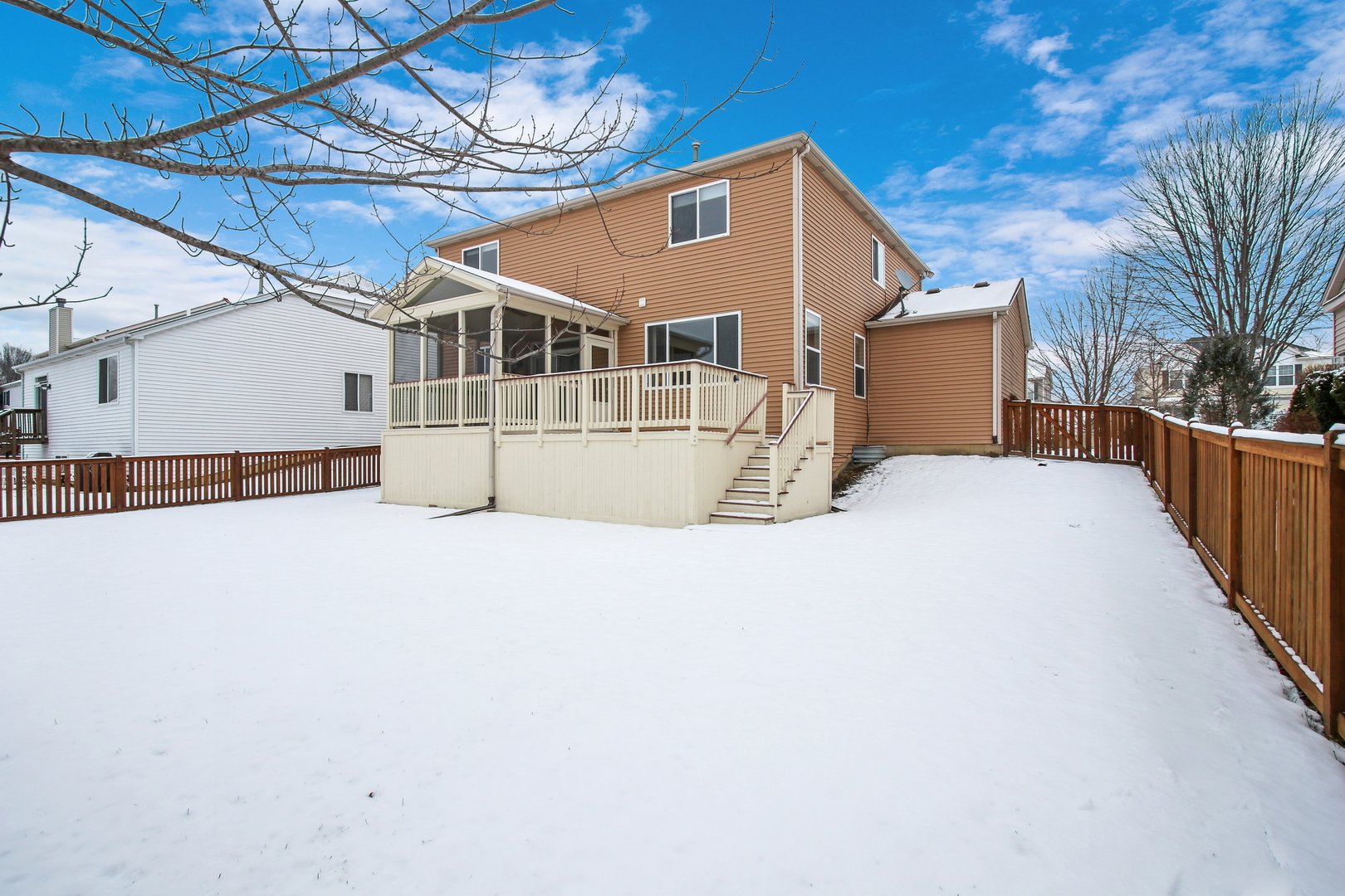 1014 Devon Drive Antioch, IL 60002 - Photo 13 of 51 a view of a house with a roof deck