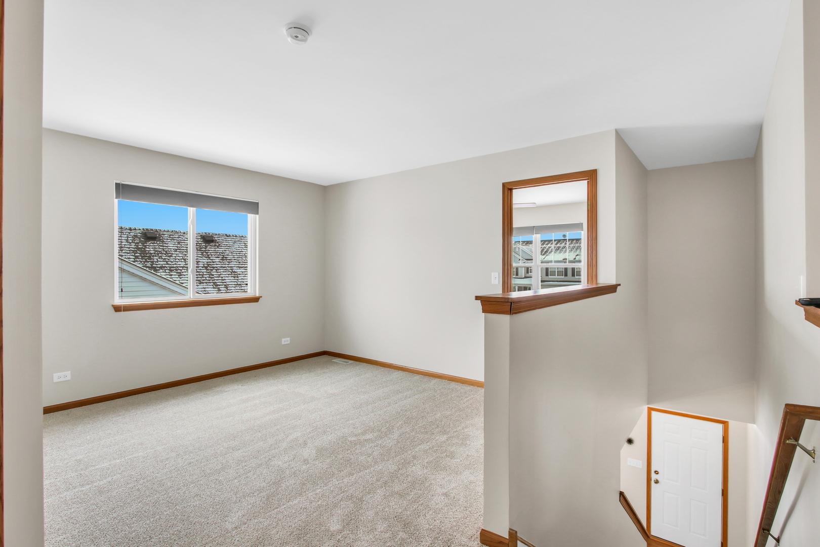 1014 Devon Drive Antioch, IL 60002 - Photo 38 of 51 an empty room with windows