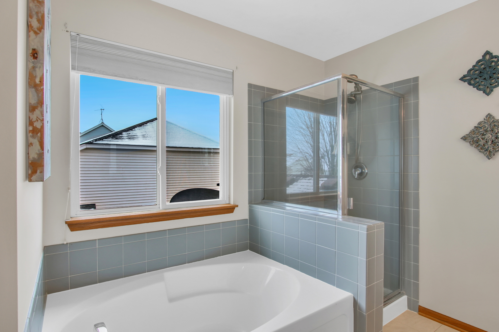 1014 Devon Drive Antioch, IL 60002 - Photo 44 of 51 a bathroom with a tub and a shower