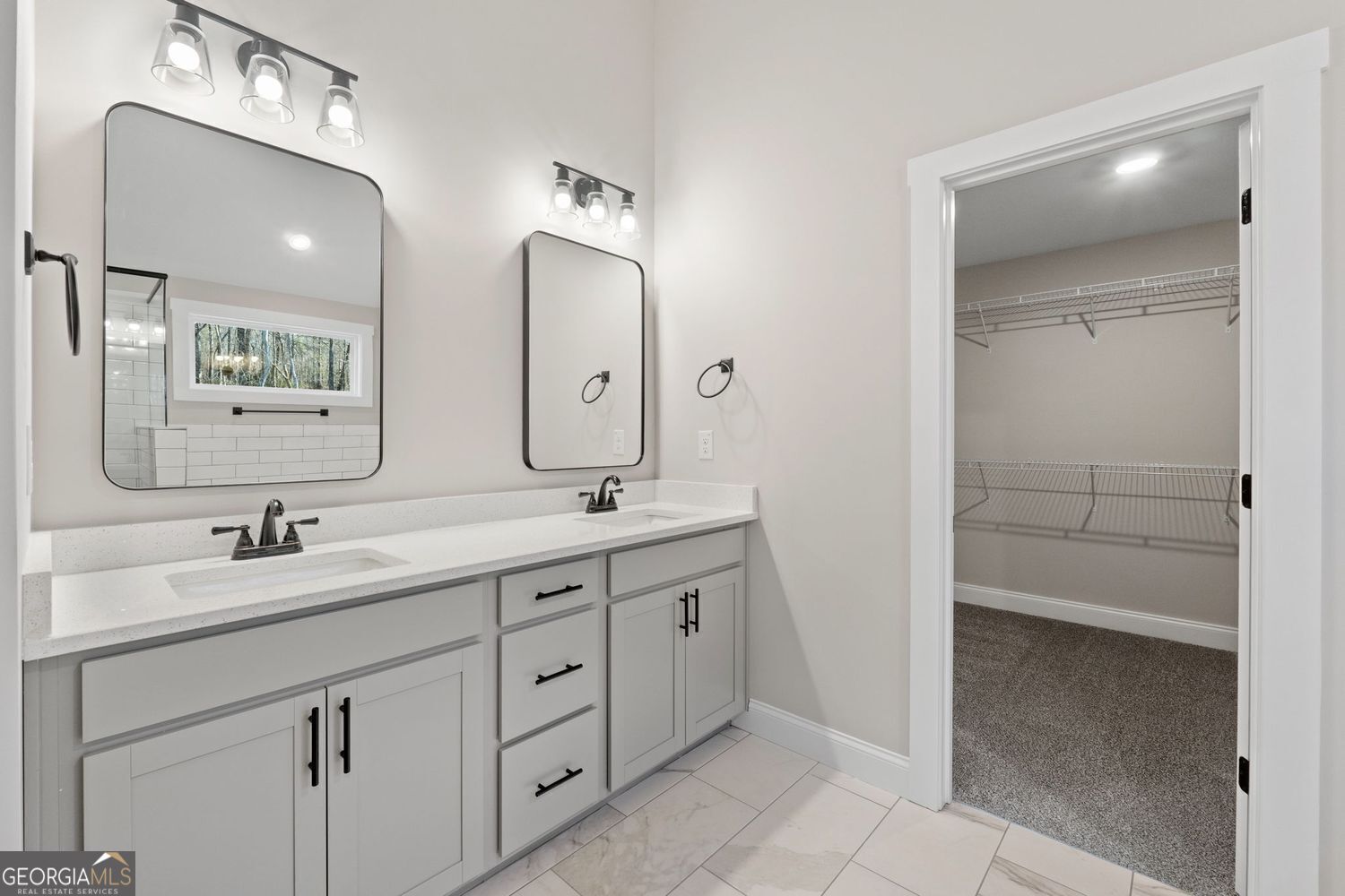 1578 English Road Forsyth, GA 31029 - Photo 24 of 39 a bathroom with a double vanity sink mirror and next