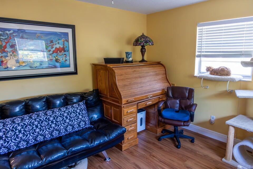 1202 East Madison Avenue Stuart, FL 34996 - Photo 13 of 23 a living room with furniture