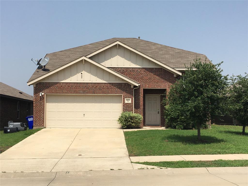 9055 Switchgrass Lane Forney, TX 75126 - Photo 1 of 1 a front view of a house with a yard and garage