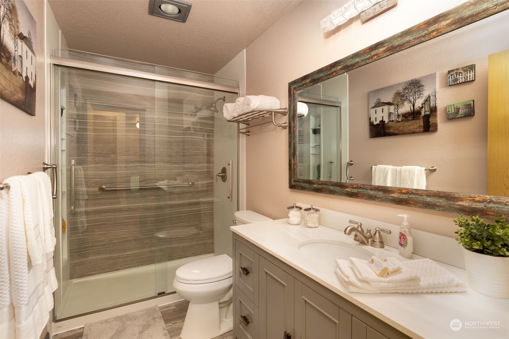 10021 Wagner Road Snohomish, WA 98290 - Photo 14 of 28 a bathroom with a granite countertop sink toilet and shower