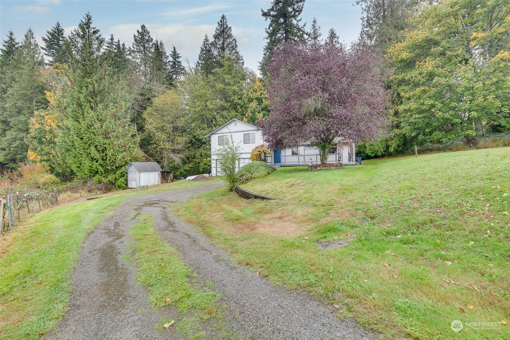 10021 Wagner Road Snohomish, WA 98290 - Photo 27 of 28 a pathway of a house with a yard