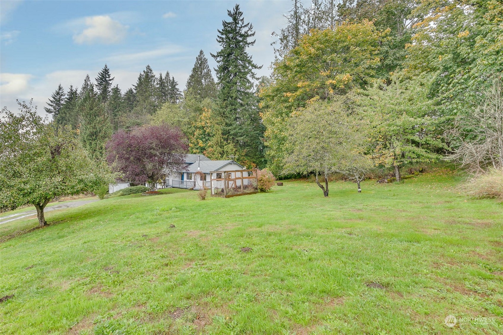 10021 Wagner Road Snohomish, WA 98290 - Photo 28 of 28 a backyard of a house with lots of green space