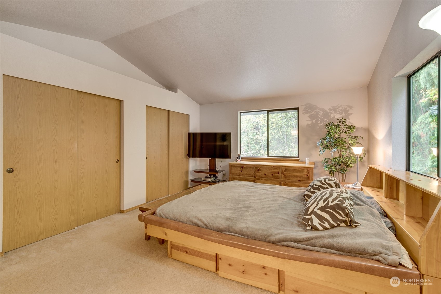 10021 Wagner Road Snohomish, WA 98290 - Photo 10 of 28 a bedroom with a bed and a window