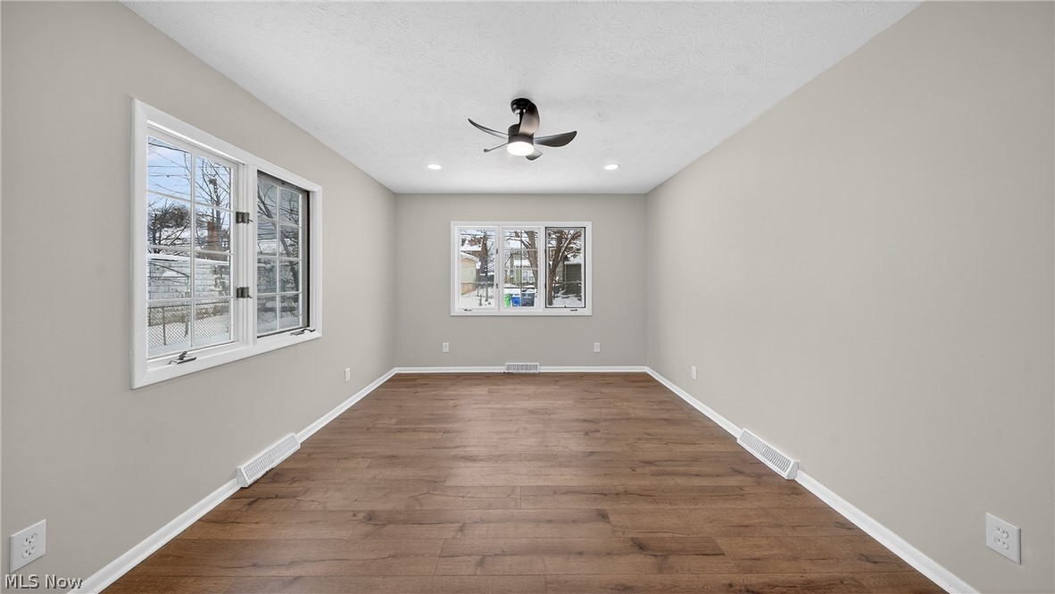 16811 Invermere Avenue Cleveland, OH 44128 - Photo 24 of 47 Spare room with wood-type flooring, ceiling fan, and recessed lighting