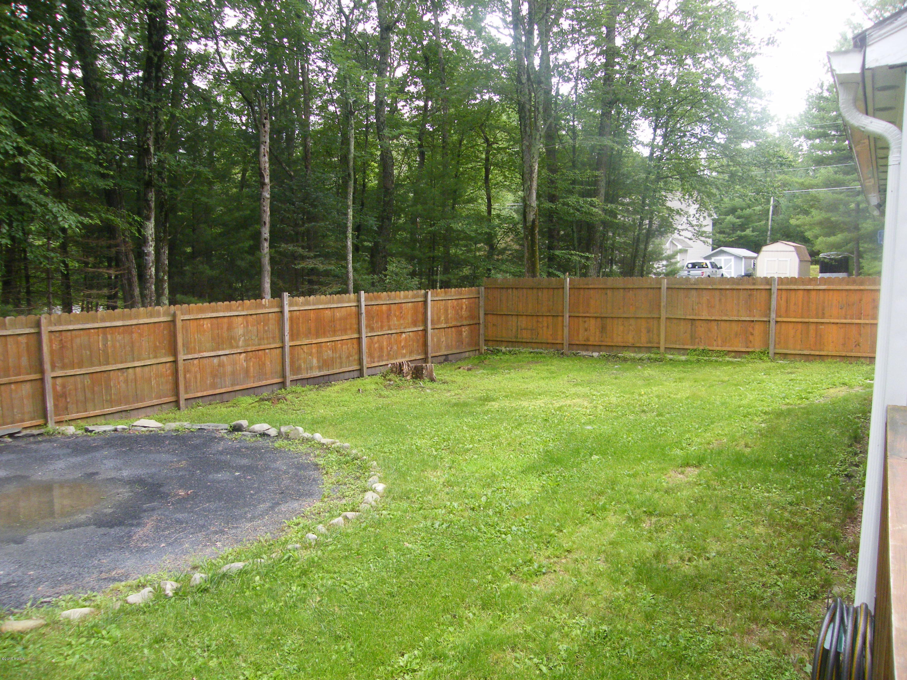 108 Tower Road Dingmans Ferry, PA 18328 - Photo 4 of 16 Side yard for above ground pool