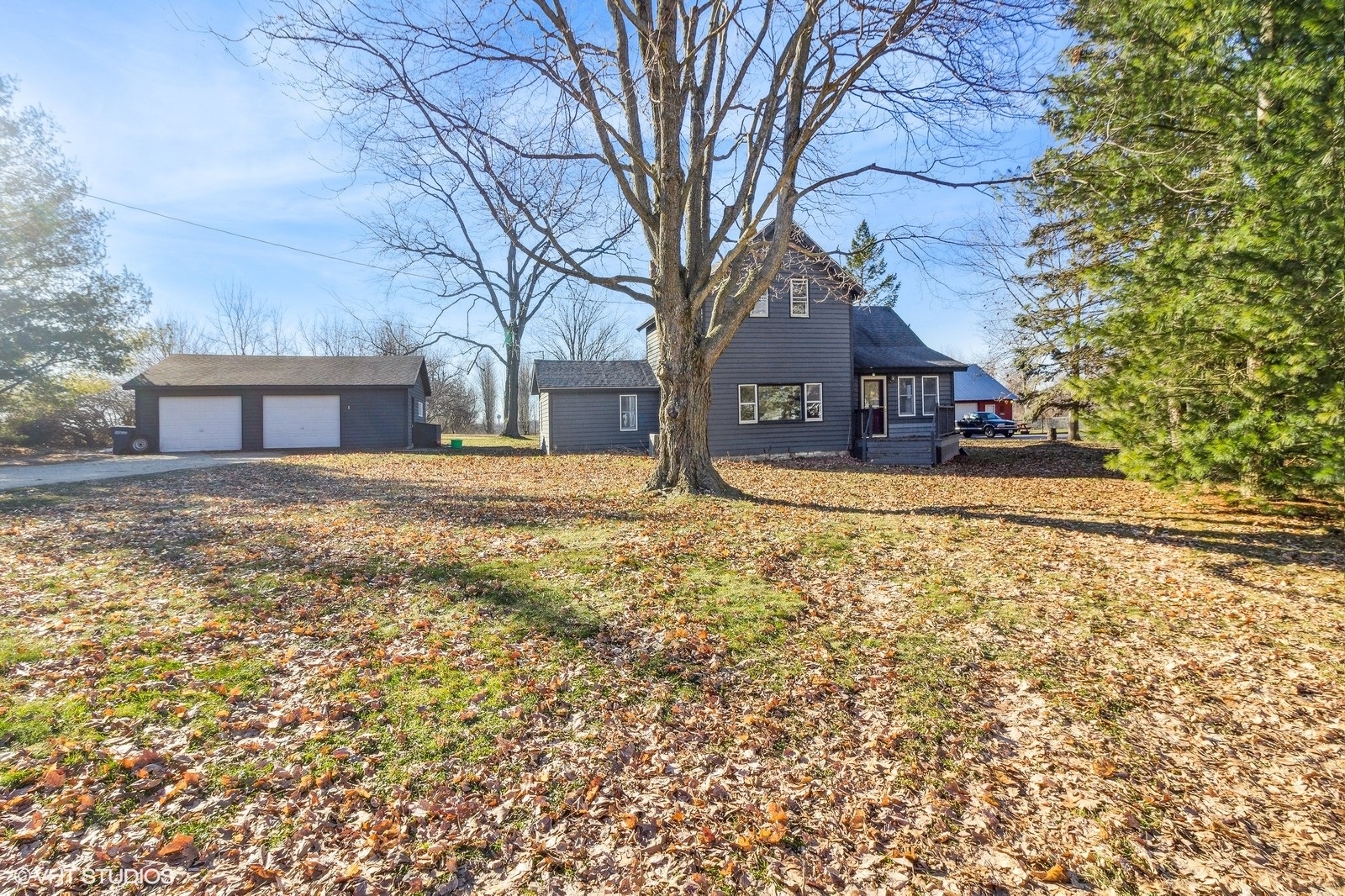front view of a house with a yard