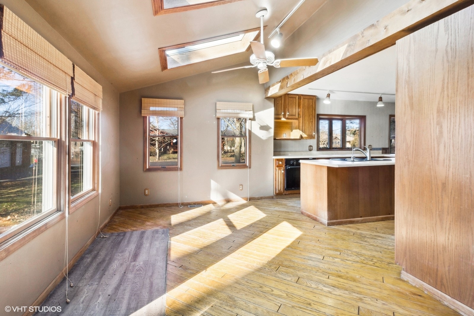 41 West 573 Lenz Road Elgin, IL 60124 - Photo 12 of 21 a view of a kitchen with a sink cabinets and wooden floor